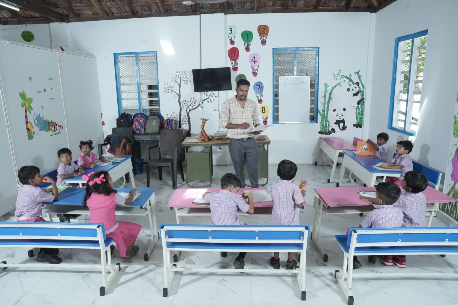 Young learners in a colourful classroom